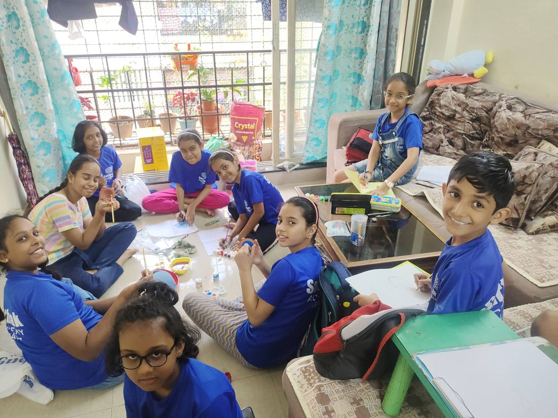 Students working on an art activity together